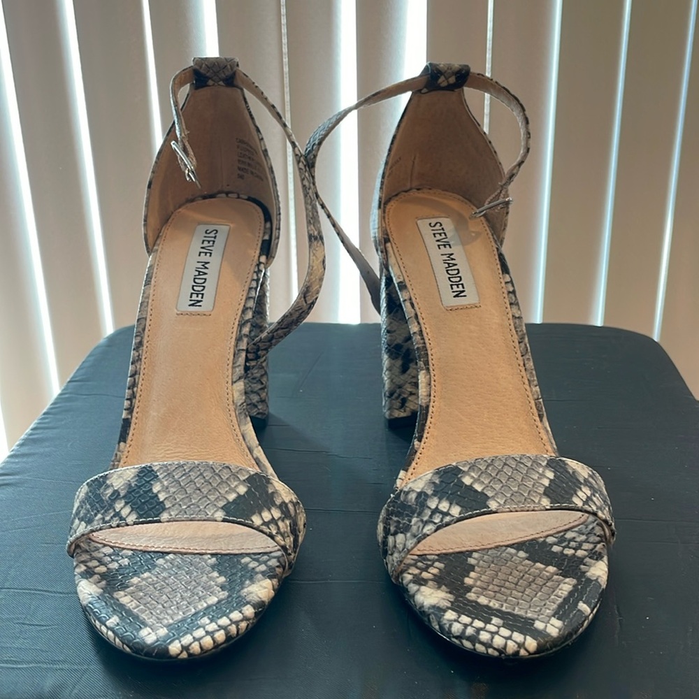 Snake print high heels.